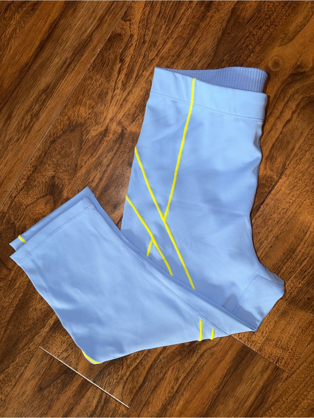 Fabletics Light Blue Cropped Athletic Leggings with Neon Yellow Trim